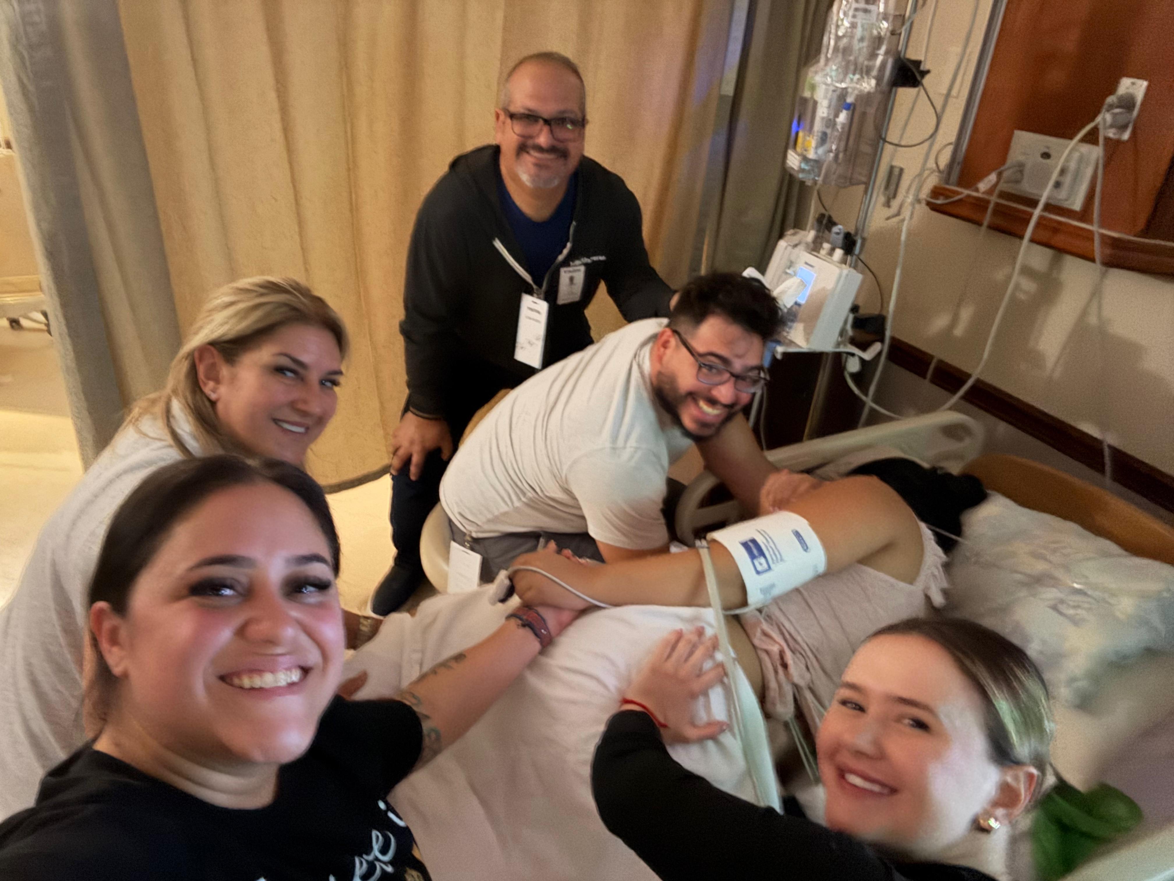 The birth team celebrating together in the delivery room