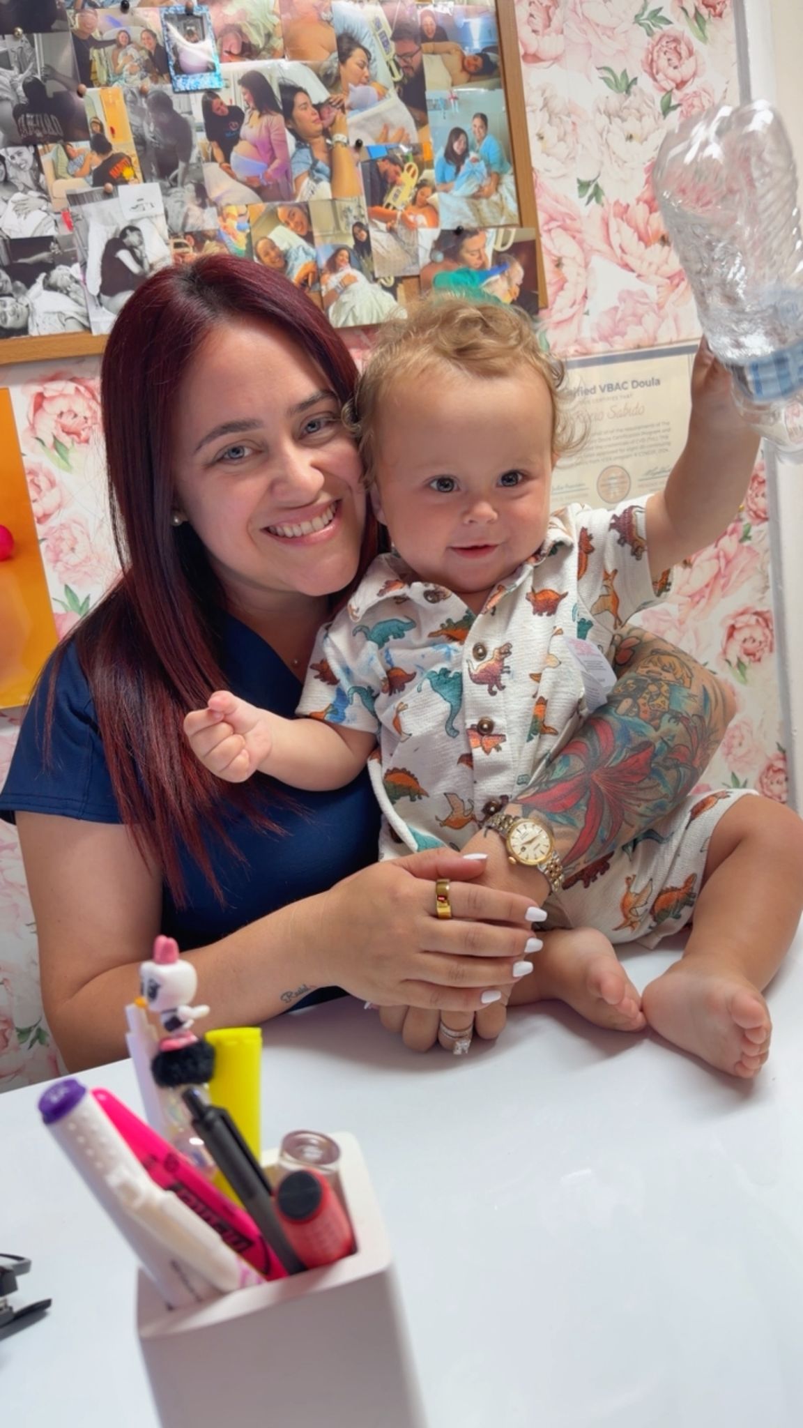 Doula Rosy Sabido with a smiling toddler at the Blooming Bellies studio